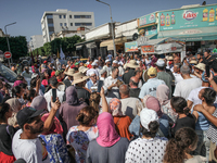 People are attending the procession of Sidi Bou Said held in Ariana, Tunisia, on August 11, 2024. The annual procession (Arab: Kharja) known...