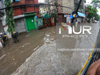 A street is flooding during the heavy monsoon rain in Kolkata, India, on August 18, 2024. (