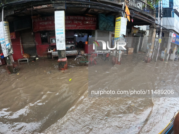 A street is flooding during the heavy monsoon rain in Kolkata, India, on August 18, 2024. 