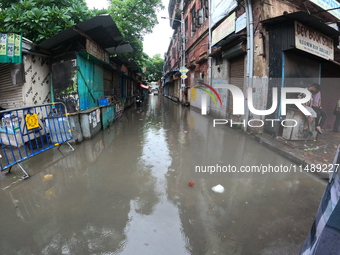 A street is flooding during the heavy monsoon rain in Kolkata, India, on August 18, 2024. (