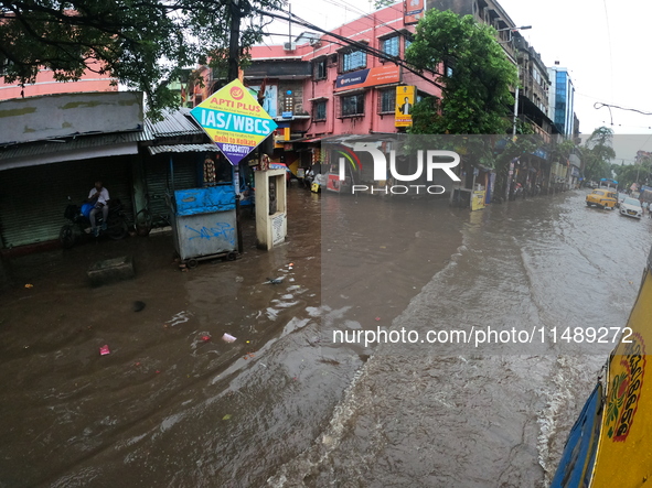 A street is flooding during the heavy monsoon rain in Kolkata, India, on August 18, 2024. 