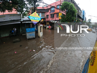 A street is flooding during the heavy monsoon rain in Kolkata, India, on August 18, 2024. (