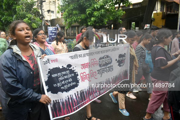 Doctors are marching on the street during a protest condemning the rape and murder of a trainee medic at a government-run hospital, in Kolka...