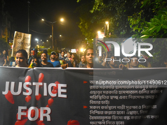 Women are protesting over the sexual assault and murder of a postgraduate woman doctor in Kolkata, India, on August 18, 2024. (