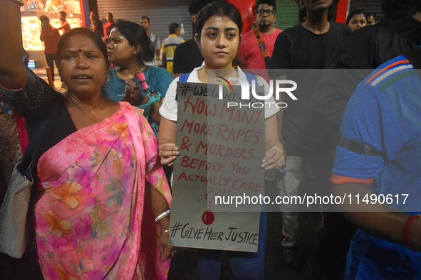 People are protesting over the sexual assault and murder of a postgraduate woman doctor in Kolkata, India, on August 18, 2024. 