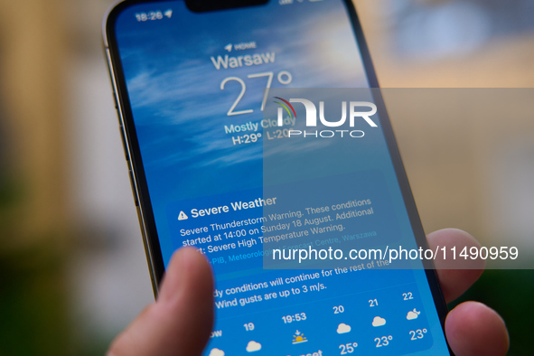 The weather application is seen showing the forecast in this illustration photo taken in Warsaw, Poland on 18 August, 2024. 