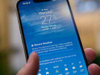 The weather application is seen showing the forecast in this illustration photo taken in Warsaw, Poland on 18 August, 2024. (