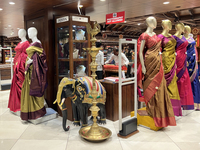 Fancy sarees are being displayed at a textile shop in Thiruvananthapuram, Kerala, India, on April 10, 2024. (