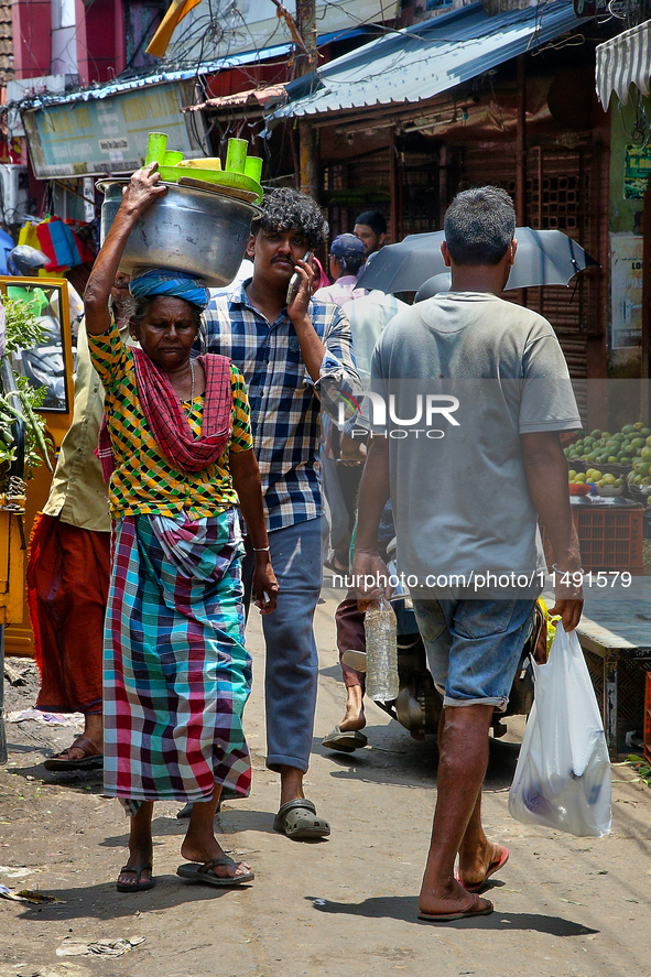 A crowded street is bustling at the Chalai market in Thiruvananthapuram (Trivandrum), Kerala, India, on April 13, 2024. The Chalai Market (C...