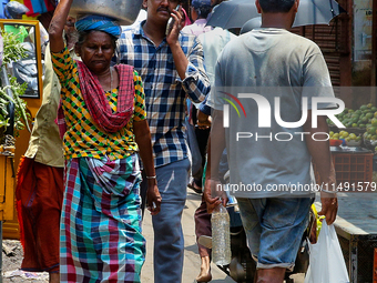 A crowded street is bustling at the Chalai market in Thiruvananthapuram (Trivandrum), Kerala, India, on April 13, 2024. The Chalai Market (C...