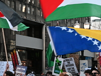 Protesters are marching in a March on the Eve of the DNC event downtown in Chicago, Illinois, United States, on August 18, 2024. Protesters...