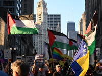 Protesters are marching in a March on the Eve of the DNC event downtown in Chicago, Illinois, United States, on August 18, 2024. Protesters...