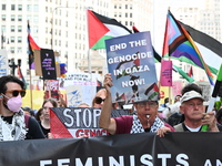 Protesters are marching in a March on the Eve of the DNC event downtown in Chicago, Illinois, United States, on August 18, 2024. Protesters...