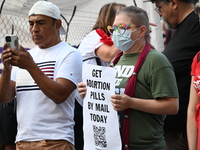 Protesters are marching in a March on the Eve of the DNC event downtown in Chicago, Illinois, United States, on August 18, 2024. Protesters...