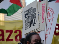 Protesters are marching in a March on the Eve of the DNC event downtown in Chicago, Illinois, United States, on August 18, 2024. Protesters...