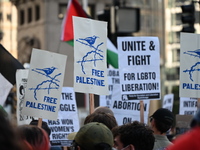 Protesters are marching in a March on the Eve of the DNC event downtown in Chicago, Illinois, United States, on August 18, 2024. Protesters...