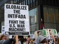 Protesters are marching in a March on the Eve of the DNC event downtown in Chicago, Illinois, United States, on August 18, 2024. Protesters...