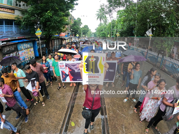 Members of the West Bengal Junior Doctors' Front and nursing students are joining a protest march against the rape and murder of a postgradu...