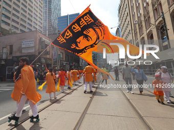 People gathered at Nathan Phillips Square to celebrate India's 77th Independence Day in Toronto, Canada, on August 18, 2024. (