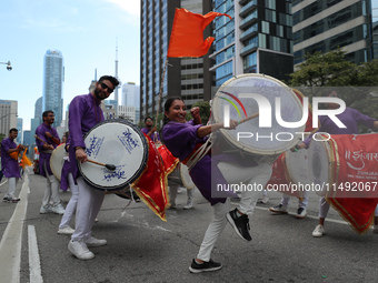 People gathered at Nathan Phillips Square to celebrate India's 77th Independence Day in Toronto, Canada, on August 18, 2024. (