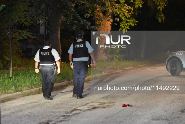 A 20-year-old male is being shot numerous times and seriously wounded in Chicago, Illinois, United States, on August 18, 2024. Chicago polic...