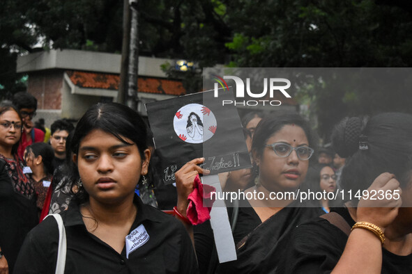 People are participating in a protest rally against the rape and murder of a second-year PGD Doctor at RG Kar Medical College, in Kolkata, I...