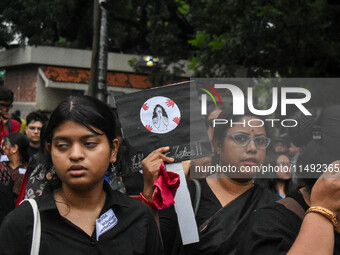 People are participating in a protest rally against the rape and murder of a second-year PGD Doctor at RG Kar Medical College, in Kolkata, I...