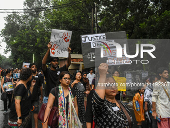 People are participating in a protest rally against the rape and murder of a second-year PGD Doctor at RG Kar Medical College, in Kolkata, I...