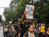 People are participating in a protest rally against the rape and murder of a second-year PGD Doctor at RG Kar Medical College, in Kolkata, I...