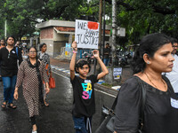 People are participating in a protest rally against the rape and murder of a second-year PGD Doctor at RG Kar Medical College, in Kolkata, I...