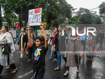 People are participating in a protest rally against the rape and murder of a second-year PGD Doctor at RG Kar Medical College, in Kolkata, I...