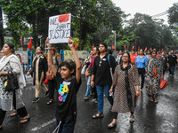 People are participating in a protest rally against the rape and murder of a second-year PGD Doctor at RG Kar Medical College, in Kolkata, I...