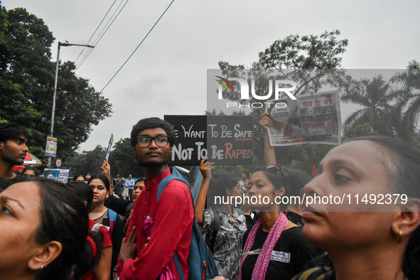 People are participating in a protest rally against the rape and murder of a second-year PGD Doctor at RG Kar Medical College, in Kolkata, I...