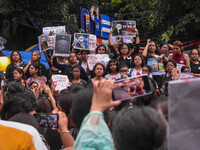 People are participating in a protest rally against the rape and murder of a second-year PGD Doctor at RG Kar Medical College, in Kolkata, I...