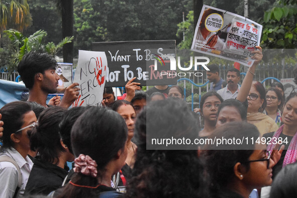 People are participating in a protest rally against the rape and murder of a second-year PGD Doctor at RG Kar Medical College, in Kolkata, I...