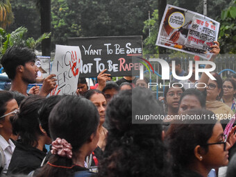 People are participating in a protest rally against the rape and murder of a second-year PGD Doctor at RG Kar Medical College, in Kolkata, I...