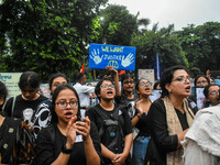 People are participating in a protest rally against the rape and murder of a second-year PGD Doctor at RG Kar Medical College, in Kolkata, I...