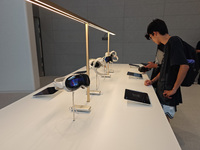 Customers are trying Apple Vision Pro at the largest Apple store in Asia in Shanghai, China, on August 19, 2024. (