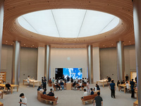 Customers are trying Apple Vision Pro at the largest Apple store in Asia in Shanghai, China, on August 19, 2024. (