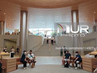 Customers are trying Apple Vision Pro at the largest Apple store in Asia in Shanghai, China, on August 19, 2024. (