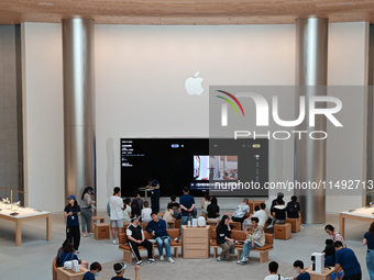 Customers are trying Apple Vision Pro at the largest Apple store in Asia in Shanghai, China, on August 19, 2024. (