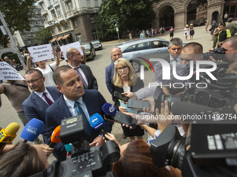 Gorica Grancharova-Kozhareva and Minister of Interior Kalin Stoyanov are speaking to the media in front of the Presidential building in Sofi...