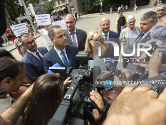 Gorica Grancharova-Kozhareva and Minister of Interior Kalin Stoyanov are speaking to the media in front of the Presidential building in Sofi...