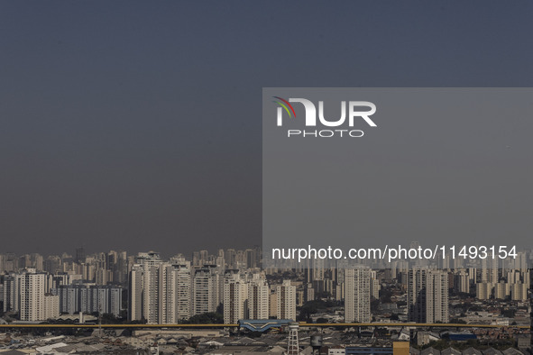 A layer of pollution is covering the sky in Sao Paulo, Brazil, on the morning of Monday, August 19, 2024. After two weeks of intense cold, S...