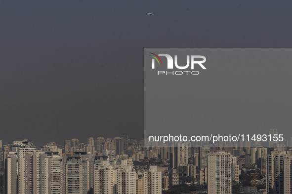 A layer of pollution is covering the sky in Sao Paulo, Brazil, on the morning of Monday, August 19, 2024. After two weeks of intense cold, S...