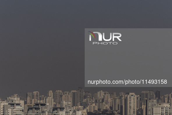 A layer of pollution is covering the sky in Sao Paulo, Brazil, on the morning of Monday, August 19, 2024. After two weeks of intense cold, S...