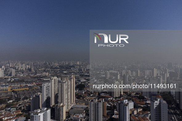 A layer of pollution is covering the sky in Sao Paulo, Brazil, on the morning of Monday, August 19, 2024. After two weeks of intense cold, S...