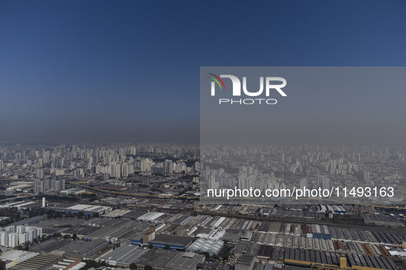 A layer of pollution is covering the sky in Sao Paulo, Brazil, on the morning of Monday, August 19, 2024. After two weeks of intense cold, S...