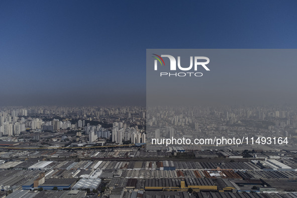 A layer of pollution is covering the sky in Sao Paulo, Brazil, on the morning of Monday, August 19, 2024. After two weeks of intense cold, S...