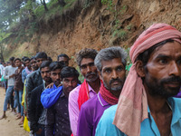 Hindu devotees are waiting in a long queue to pay their obeisance on the occasion of the Raksha Bandhan festival at the Shankaracharya templ...